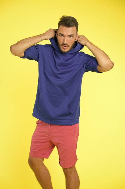 Energetic concept. Energetic man in casual wear on yellow background. Fashion for energetic you. Energetic and active - Foto, Bild