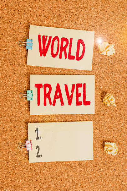 Handwriting text writing World Travel. Concept meaning the movement of showing between distant geographical locations Vertical empty sticker reminder memo square billboard corkboard desk paper. - Photo, Image