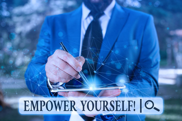 Writing note showing Empower Yourself. Business photo showcasing taking control of our life setting goals and making choices Male human wear formal suit presenting using smart device. - Fotoğraf, Görsel