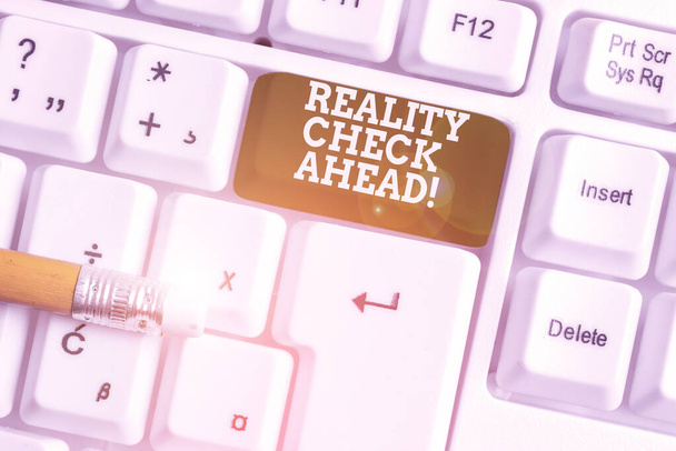 Word writing text Reality Check Ahead. Business concept for makes them recognize truth about situations or difficulties White pc keyboard with empty note paper above white background key copy space. - Photo, Image