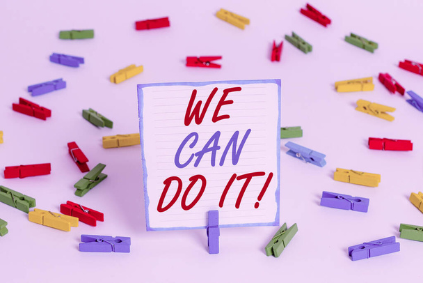 Handwriting text We Can Do It. Concept meaning see yourself as powerful capable demonstrating Colored clothespin papers empty reminder white floor background office. - Fotó, kép