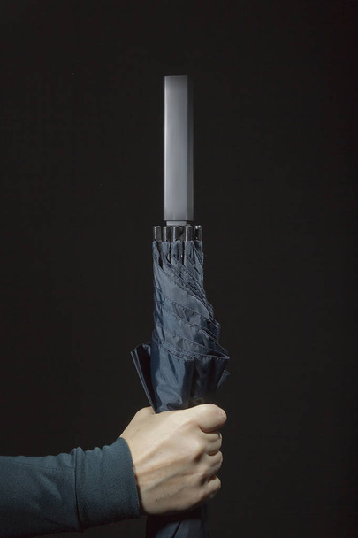 Hand with umbrella - Photo, Image