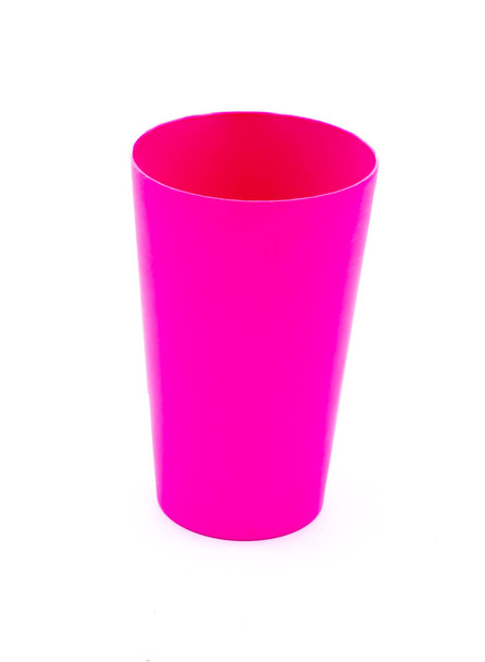 Pink plastic cup on a white background - Photo, Image