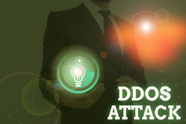 Χειρόγραφο κείμενο που γράφει Ddos Attack. Έννοια που σημαίνει δράστης επιδιώκει να καταστήσει έναν πόρο δικτύου μη διαθέσιμο στο χρήστη. - Φωτογραφία, εικόνα