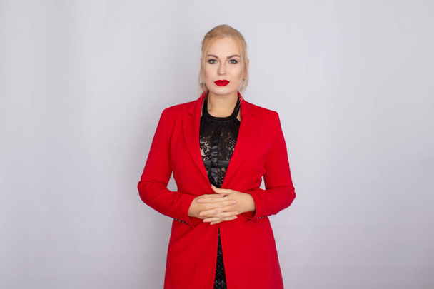 Female business woman in red jacket - Fotó, kép