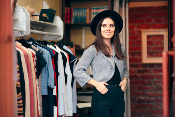 Fashionable Woman in Clothing Store with Fedora Hat - Photo, Image