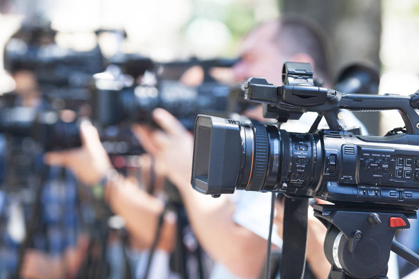 Filmování mediální události pomocí videokamery. Tisková konference. - Fotografie, Obrázek