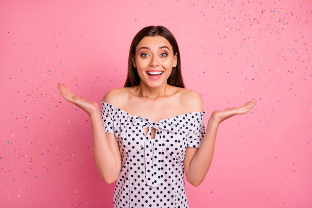 Photo of nice cute beautiful charming rejoicing enjoying woman celebrating her graduation throwing confetti around while isolated with vivid background - Zdjęcie, obraz