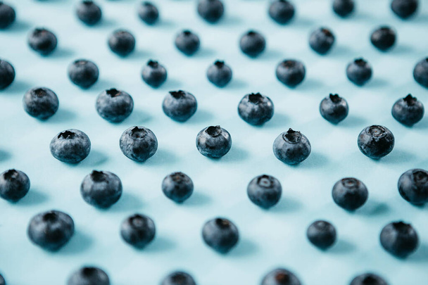 Blueberries on a blue background - Photo, Image