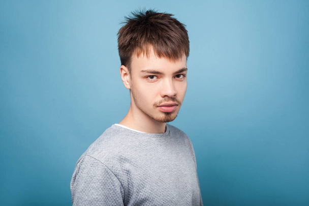 Portrait of concentrated confident brunette man with looking att - Фото, зображення