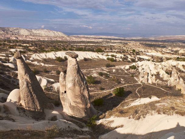 Fairy chimneys rocks at the valley near Urgup, Cappadocia, Turkey - Фото, изображение