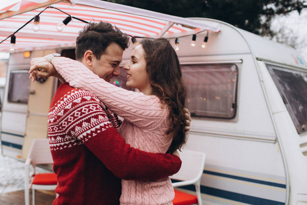 Boyfriend and the girlfriend are smiling happily. Christmas. Couple. - Valokuva, kuva