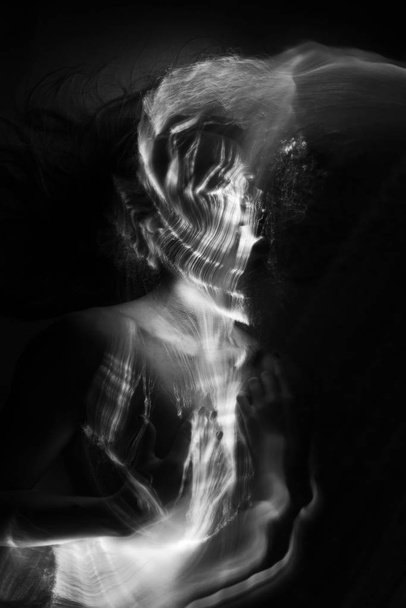 Conceptual monochrome black and white avant-garde portrait of a  - Foto, Imagen