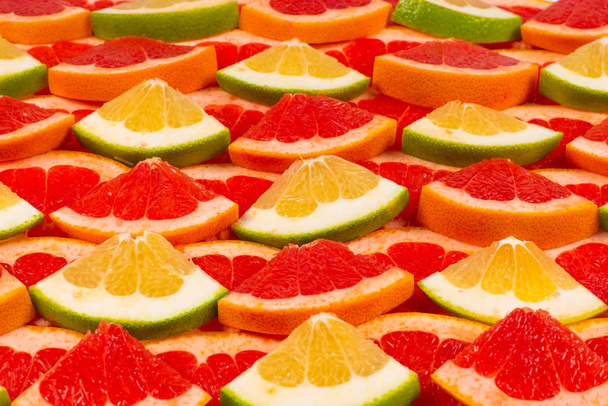 Pomelo and grapefruit slices background.  - Photo, Image