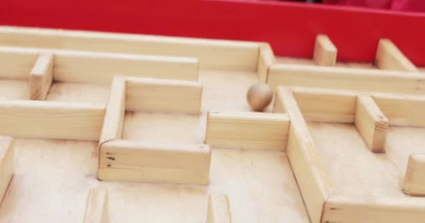 Team wooden maze in city - Кадри, відео