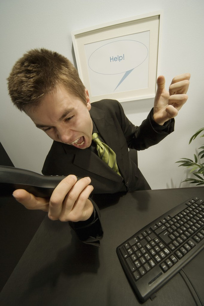 Businessman Screaming Into A Phone - Фото, изображение