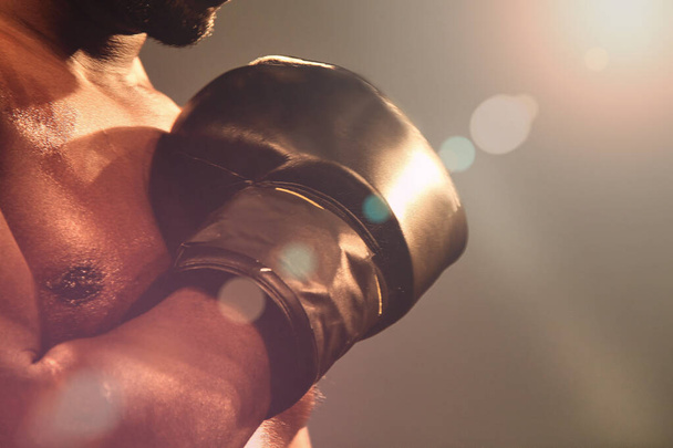 Professional boxer during match, prepairing for fight, close up - Фото, зображення
