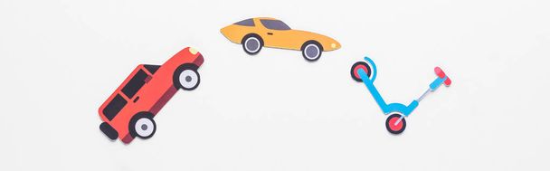 top view of paper cut vehicles on white background with copy space, panoramic shot - Photo, image