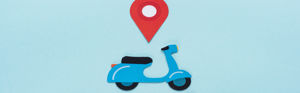 top view of paper cut scooter with location mark on blue background, panoramic shot - Photo, Image