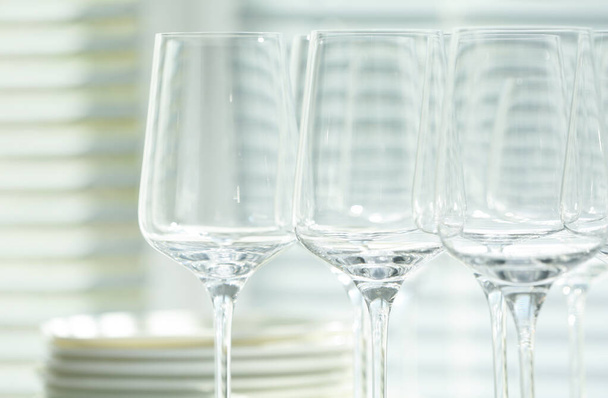 Set of empty wine glasses on blurred background, closeup - Фото, изображение