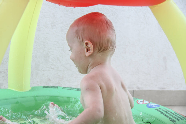 Beautiful baby boy playing at playland - Valokuva, kuva