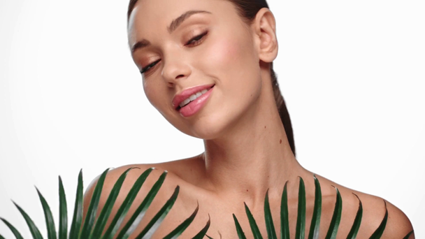 woman holding leaves isolated on white - Footage, Video