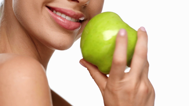 cropped view of woman holding apple isolated on white - Footage, Video
