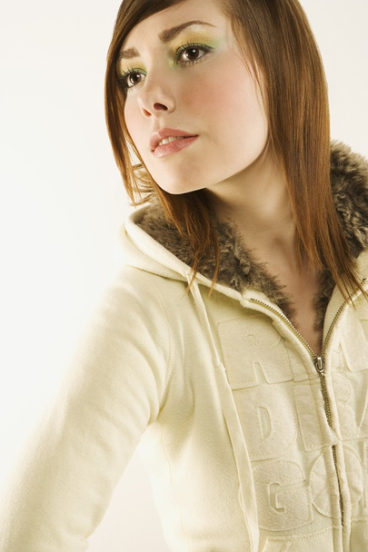 Young Woman Modelling Zip-Up, Faux-Fur, Hooded Sweater - Foto, Bild