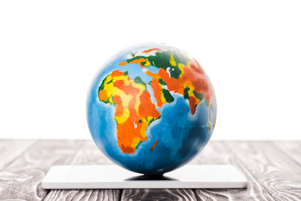 colorful globe on digital tablet isolated on white, e-commerce concept - Foto, immagini