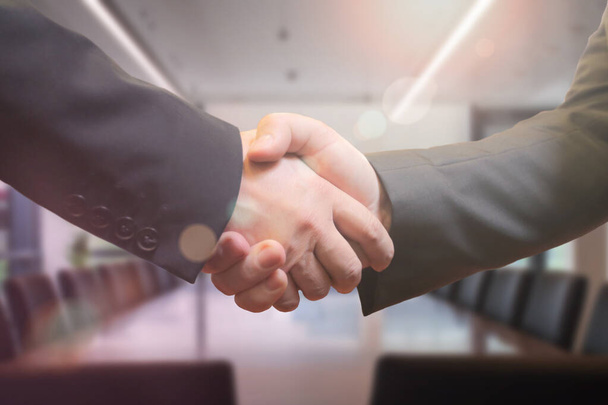 Business and office concept - businessman shaking hands each oth - Fotó, kép