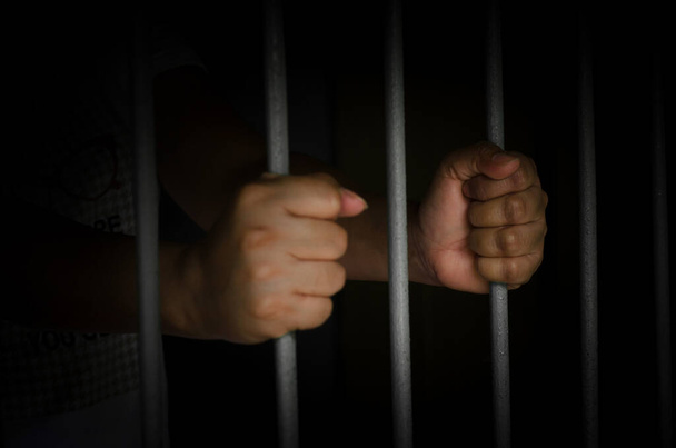 Close-up Of male  Hands  In handcuffs  - Foto, afbeelding