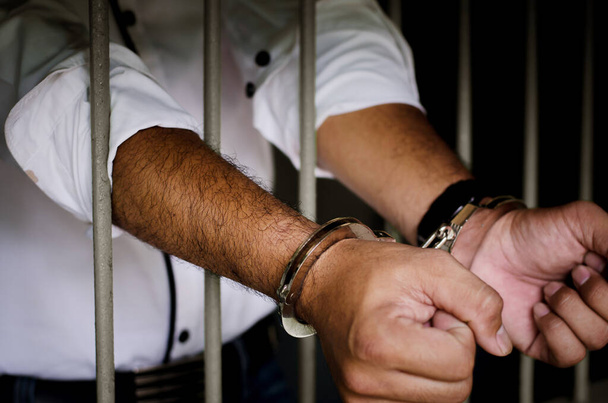 Close-up Of Businessman Hands  In Jail  - Фото, изображение