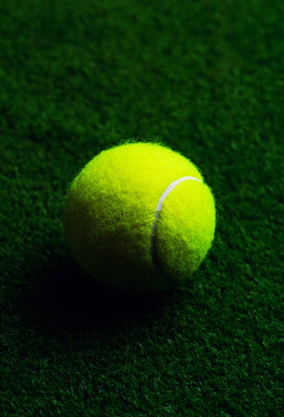 Tennis Ball isolated on black with dramatic lighting - Zdjęcie, obraz
