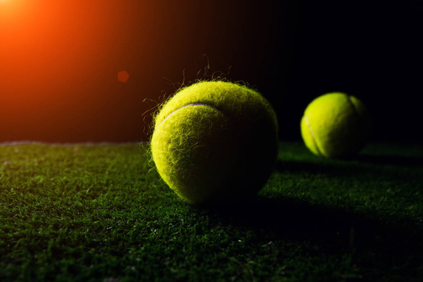 Tennis Ball isolated on black with dramatic lighting - Φωτογραφία, εικόνα