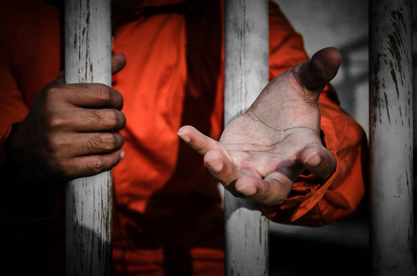 Close-up Of male  Hands  in prison - Zdjęcie, obraz