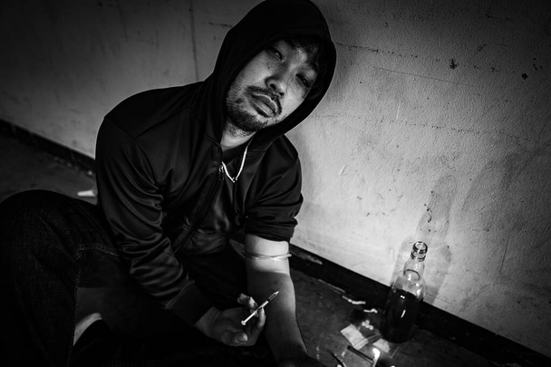 Addicted asian man suffering from depression - Fotó, kép