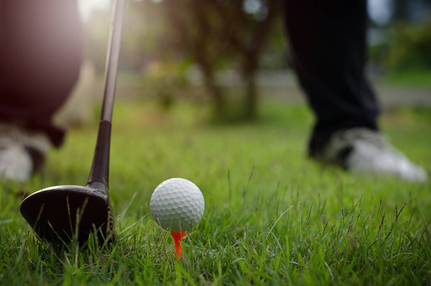 man with Golf club and golf ball, close up - Foto, imagen
