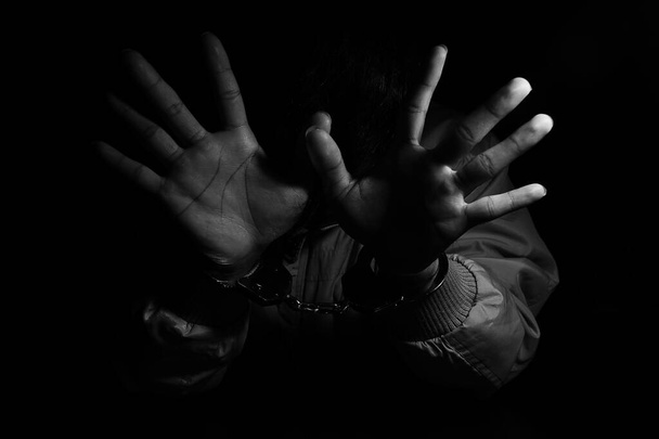 Close-up Of male  Hands  In handcuffs  - Fotó, kép