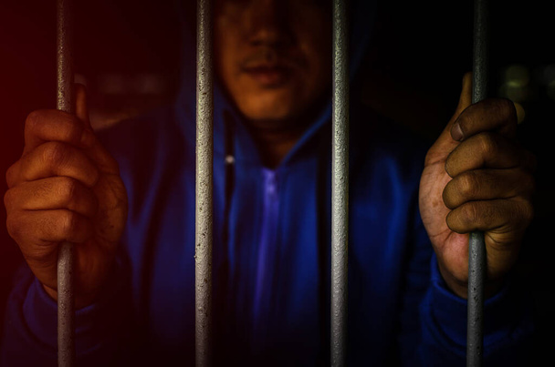 prisoner in jail, view of man in the cage  - Foto, Imagem