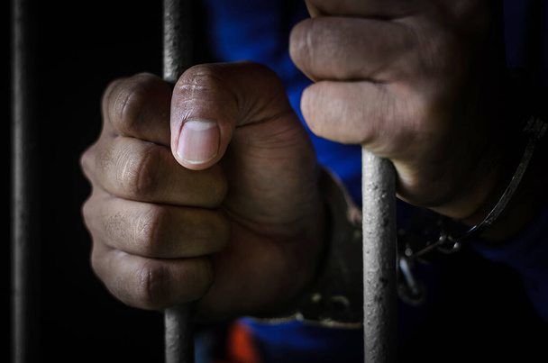 Close-up Of male  Hands  In handcuffs  - Фото, изображение