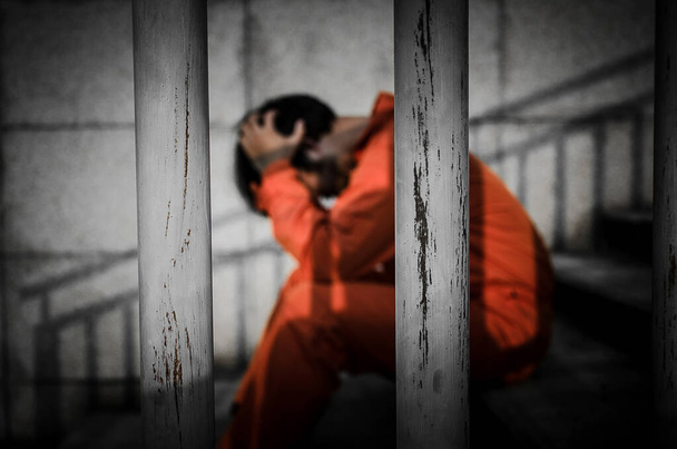 Asian depressed male prisoner                           - Zdjęcie, obraz