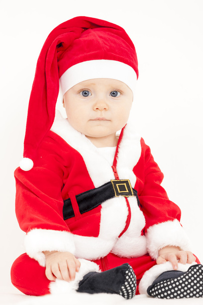 portrait of little girl as Santa Claus - Foto, imagen