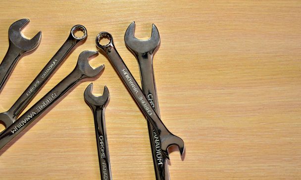 Wrench keys on a wooden background - Photo, Image