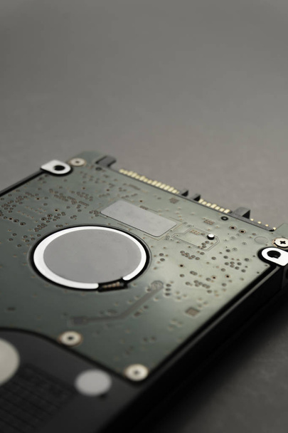 Close up of hard disk's internal mechanism hardware. Soft focus  - Photo, Image