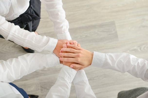 Group of people putting hands together. Unity concept - Photo, Image
