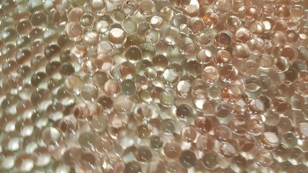 Closeup view with selective focus of shiny glittering orbeez - Photo, Image