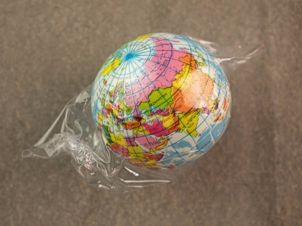 The earth in plastic bag, Global warming due to pollution by pla - Fotografie, Obrázek