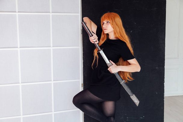 fashionable woman with red hair anime japan sword - Photo, Image