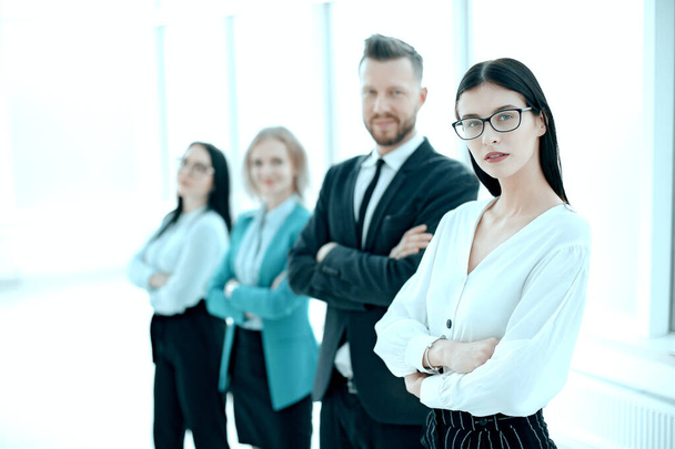 successful business woman standing in front of her business team - Foto, immagini