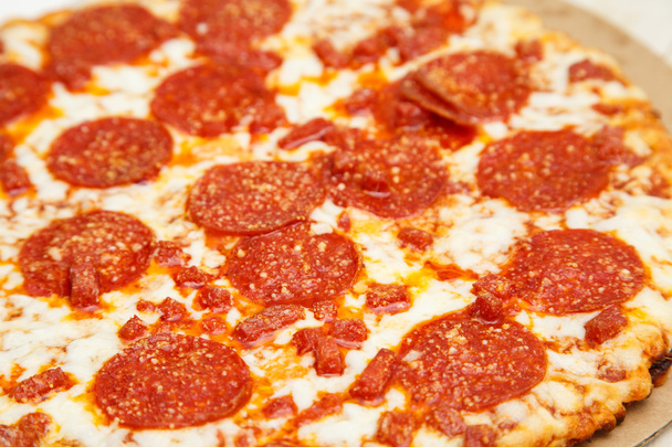 Hot Greasy Pepperoni on a Pizza - Фото, изображение